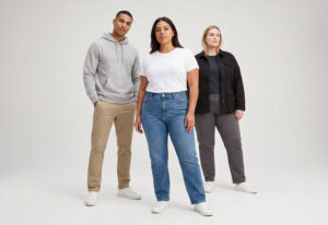 Diverse men and women models in full-category basics posed in a staggered triangle, showing inclusivity and everyday essentials at Wingtu Apparel