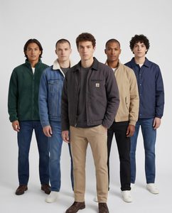 Group shot of five male models wearing a work jacket, denim jacket, Harrington, fleece jacket, and coach jacket