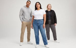 Diverse men and women models in full-category basics posed in a staggered triangle, showing inclusivity and everyday essentials at Wingtu Apparel